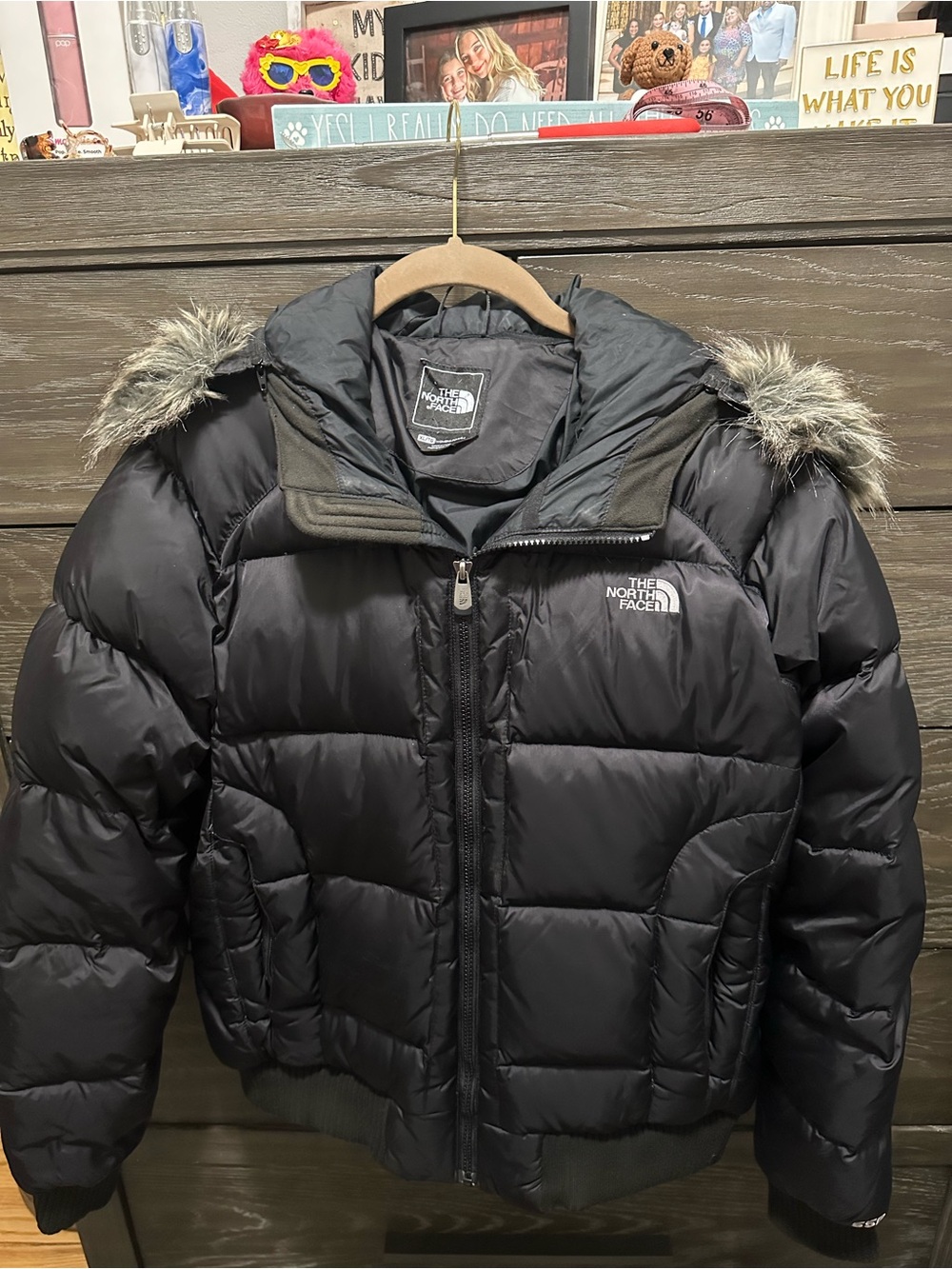 The North Face Woman’s Black Puffer Jacket with removable Faux Fur Hood